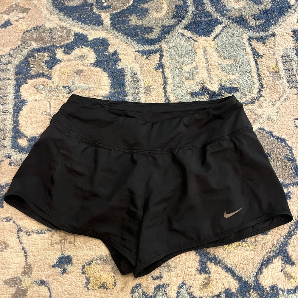 Black Nike shorts.